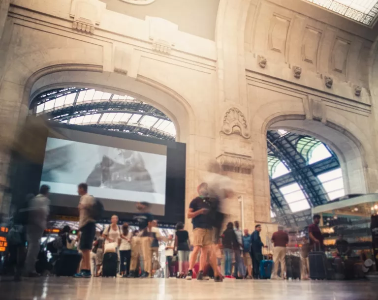 ON THE MOVE Emilia Romagna - image of a train station concourse